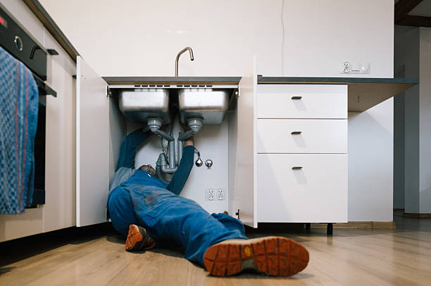 Professional Drain Cleaning technician working in Cocoa Beach, FL